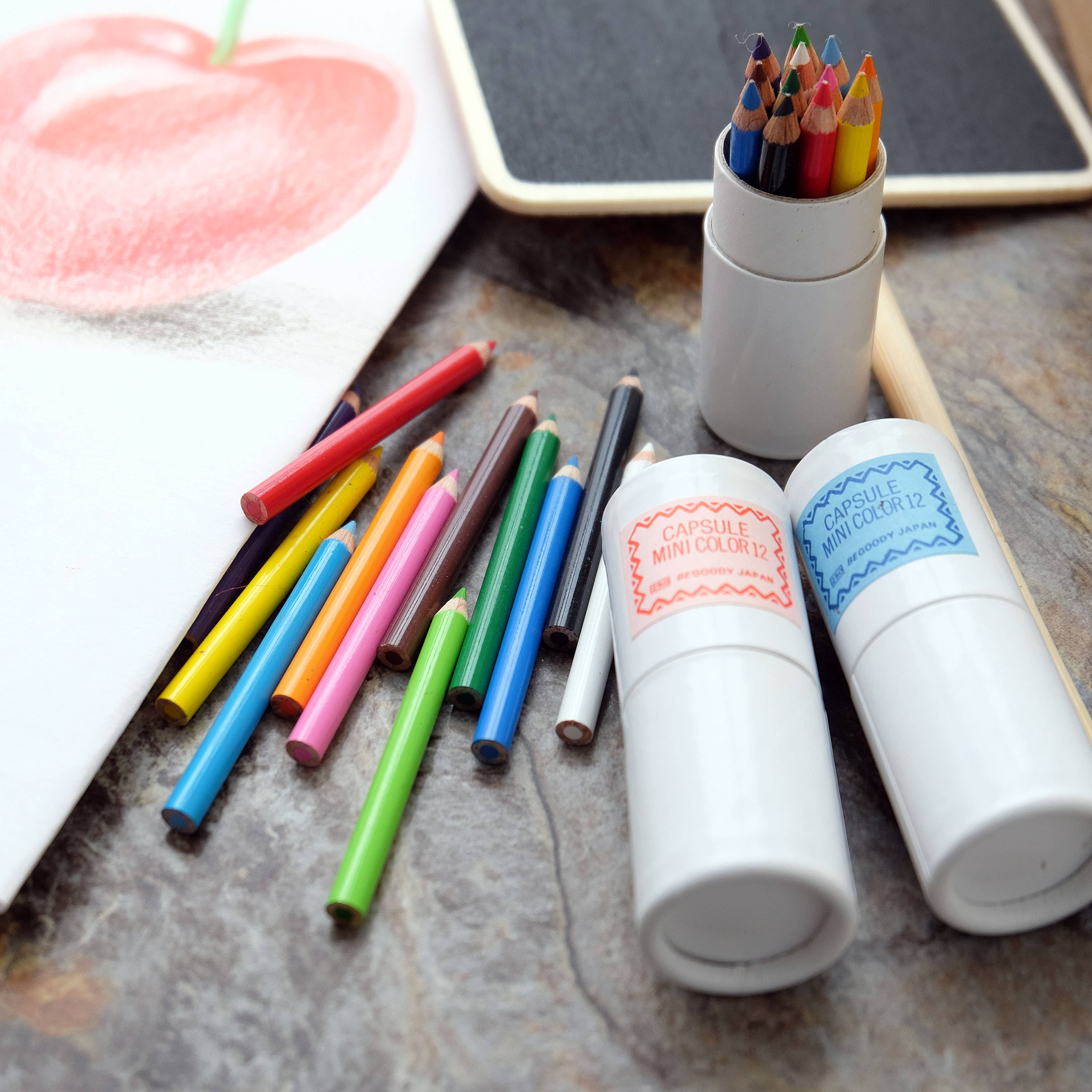 12 mini pencils in mini paper tube