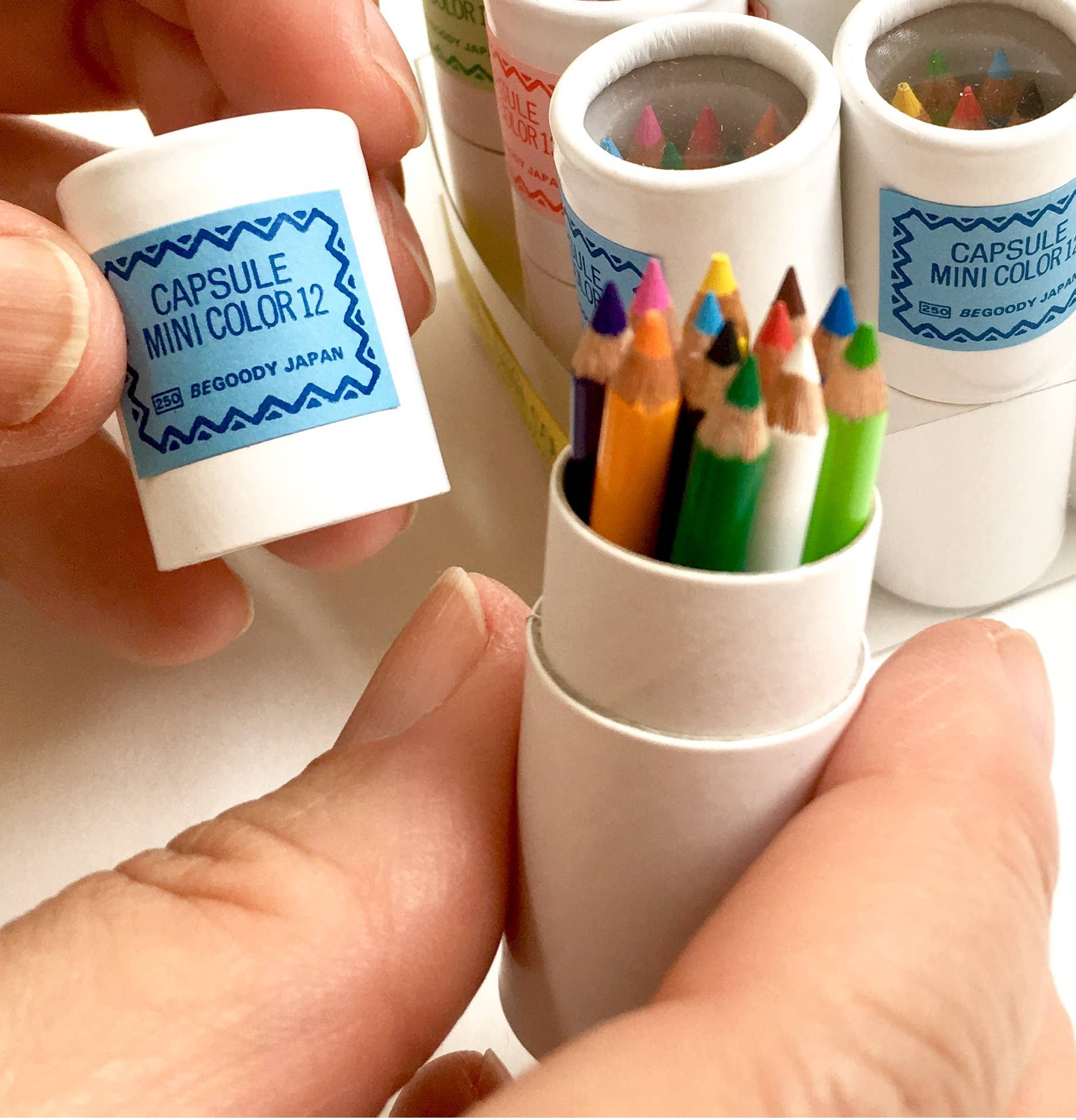 12 mini pencils in mini paper tube