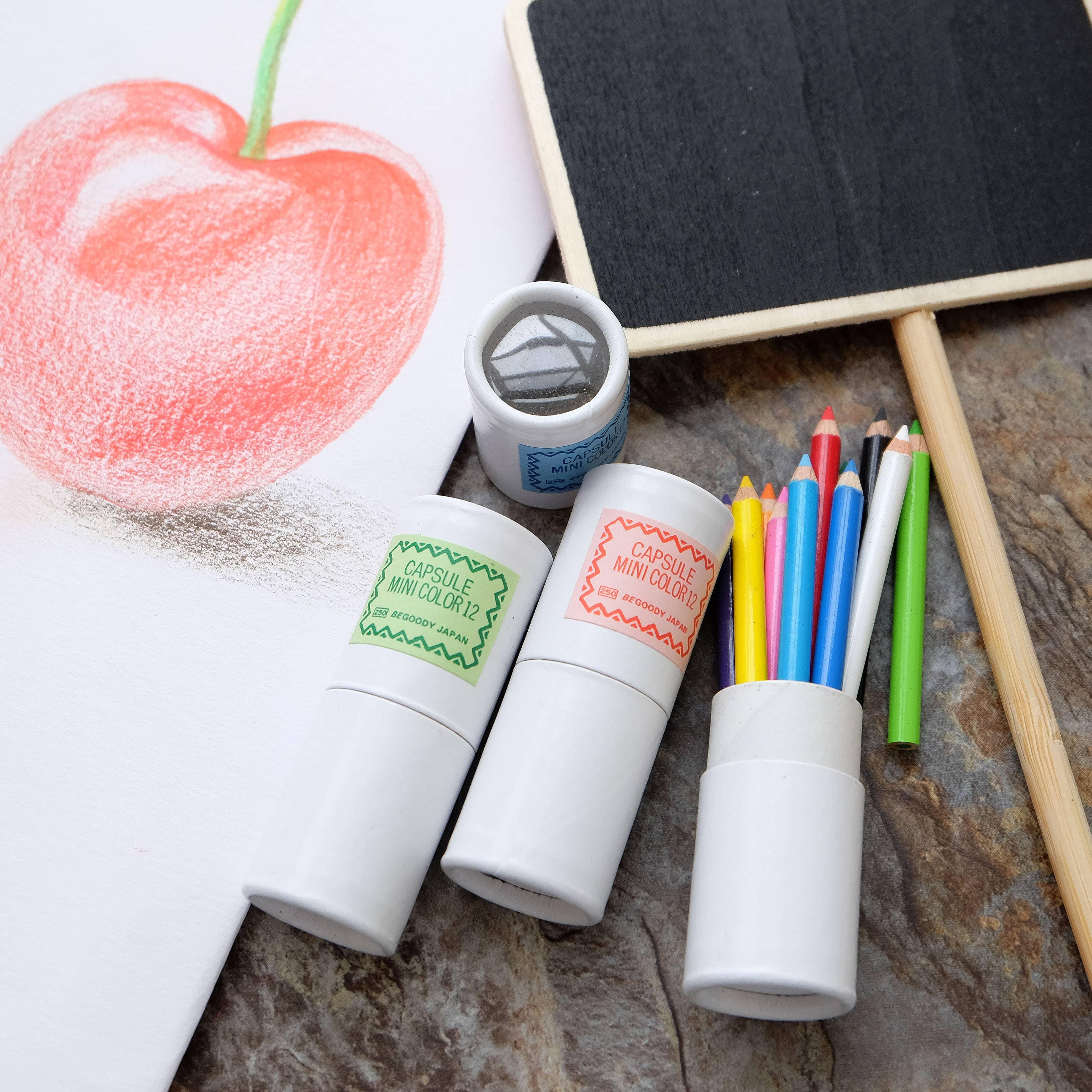 12 mini pencils in mini paper tube
