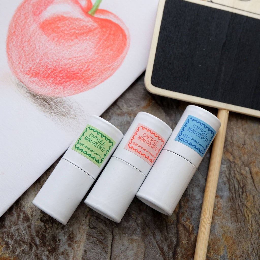 12 mini pencils in mini paper tube